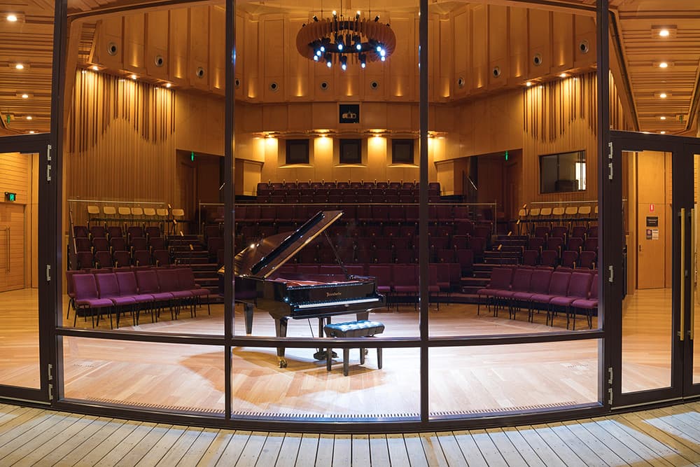 A piano inside an empty performance hall, a venue for the upcoming Adelaide Festival